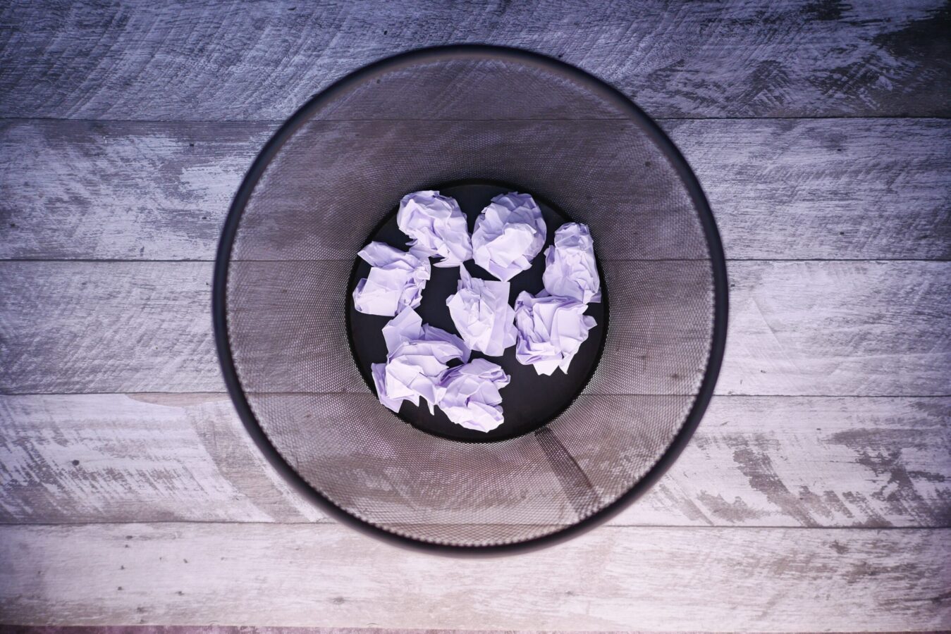 A crumpled papers inside the trash bin